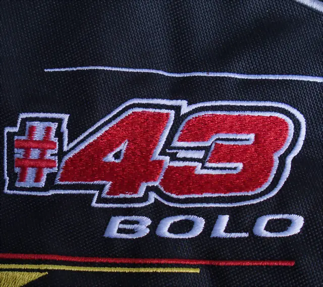 Haft numeru startowego 43 Bolo na odzieży motocyklowej