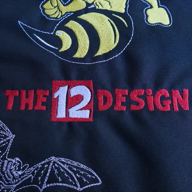 Haft The 12 Design na odzieży motocyklowej